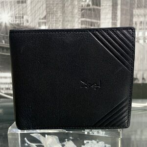 Authentic YSL Sleek black leather bifold wallet